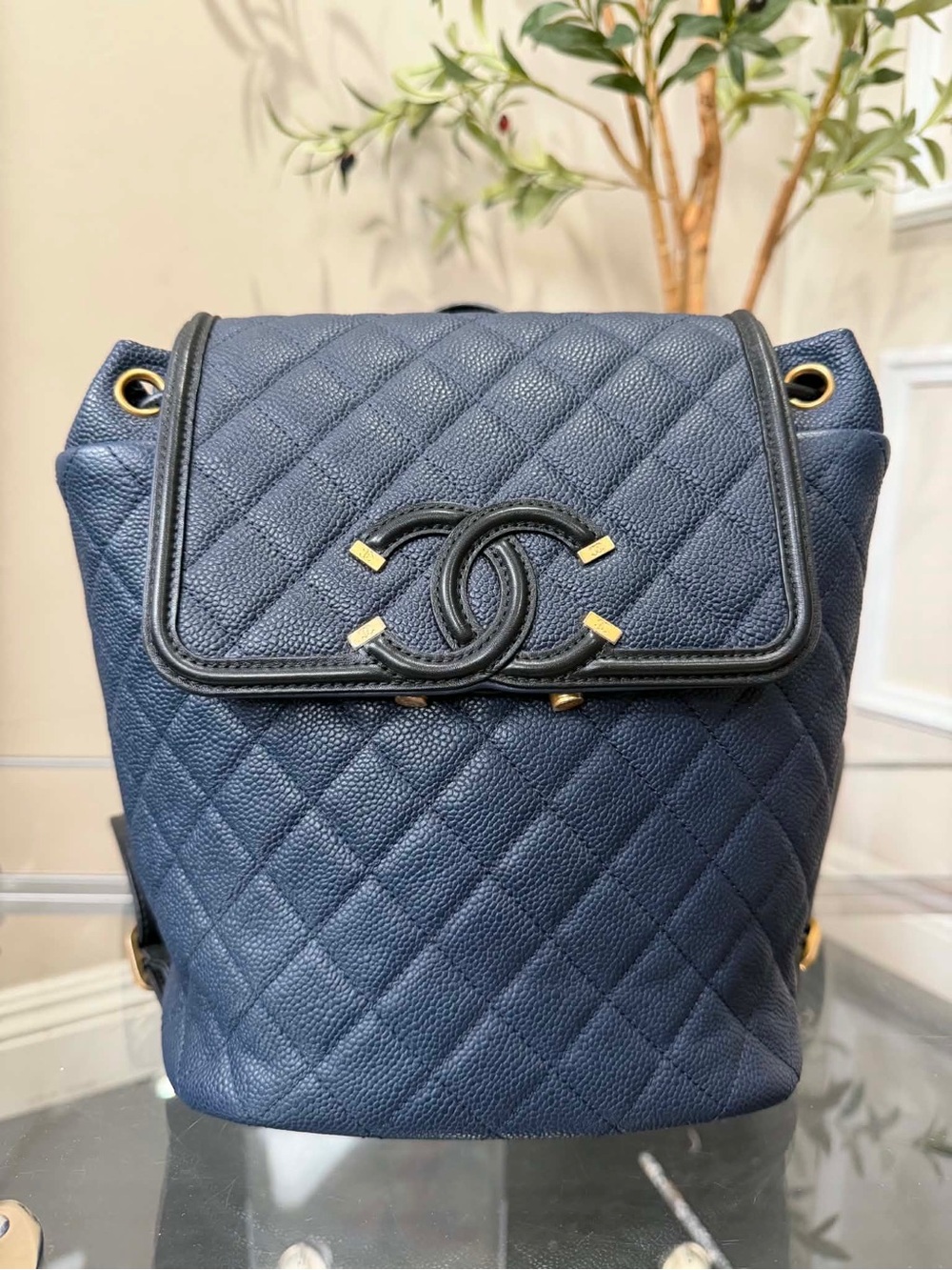 CHANEL Quilted Navy Caviar Leather Backpack with Gold Hardware